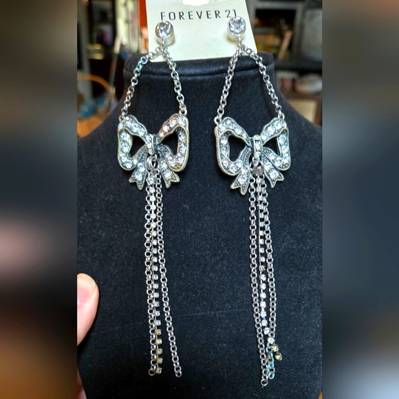 Forever 21 Jewelry - Forever 21 antiqued Rock-n-Roll bow earrings
